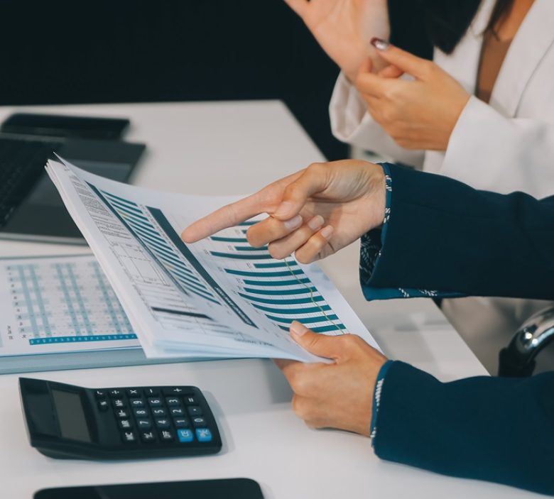 Co working conference, Business team meeting present, investor colleagues discussing new plan financial graph data on office table with laptop and digital tablet, Finance, accounting, investment.